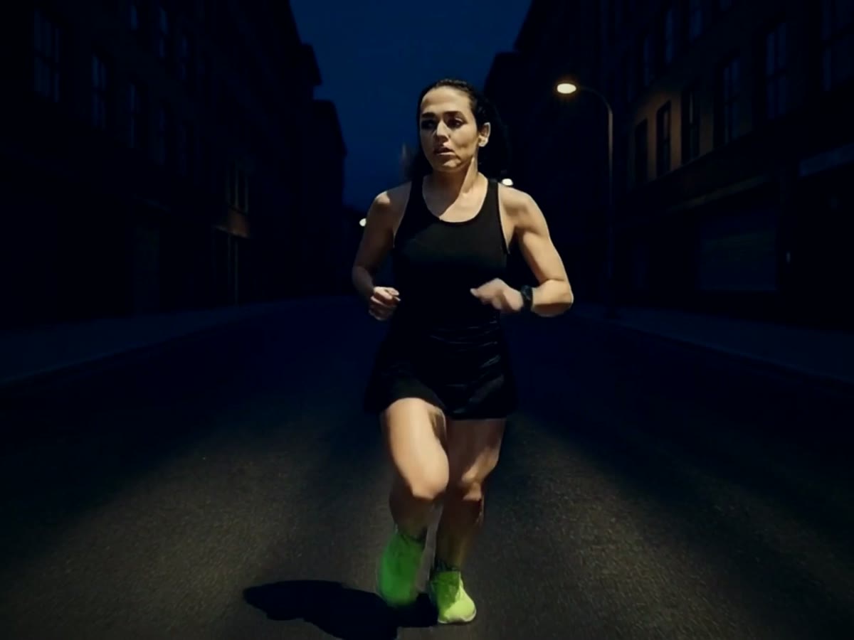 Brand Film — the Nike Keep Going hero film: an athlete on an empty road at dawn, athletic-kinetic grade, KEEP GOING brand card